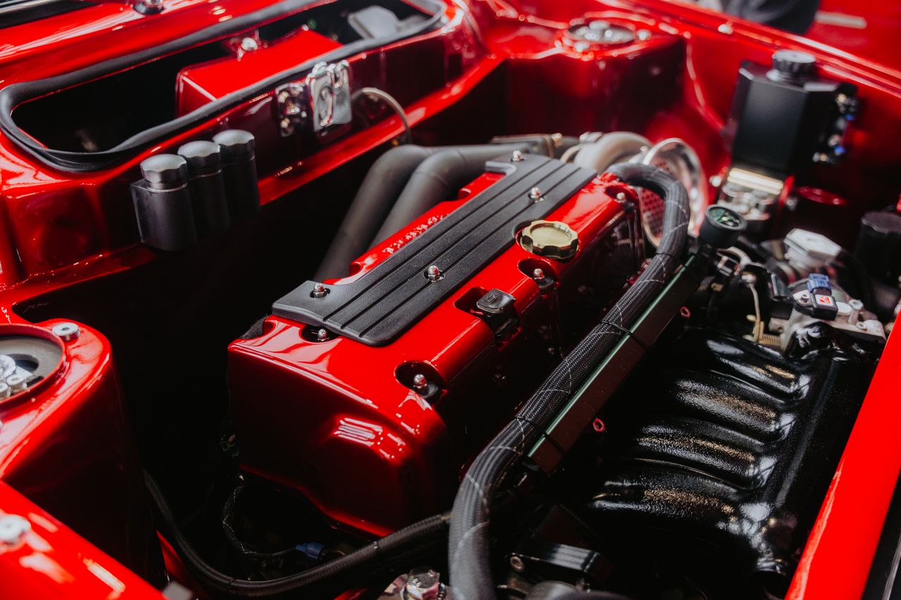 about-bg Detailed view of a high-performance engine showcasing its intricate components.